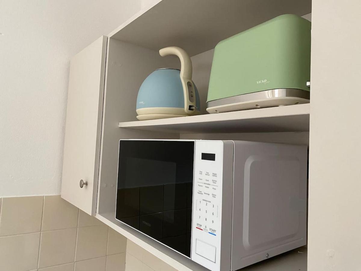 The Olive Ocean Apartment Tolo Luaran gambar
